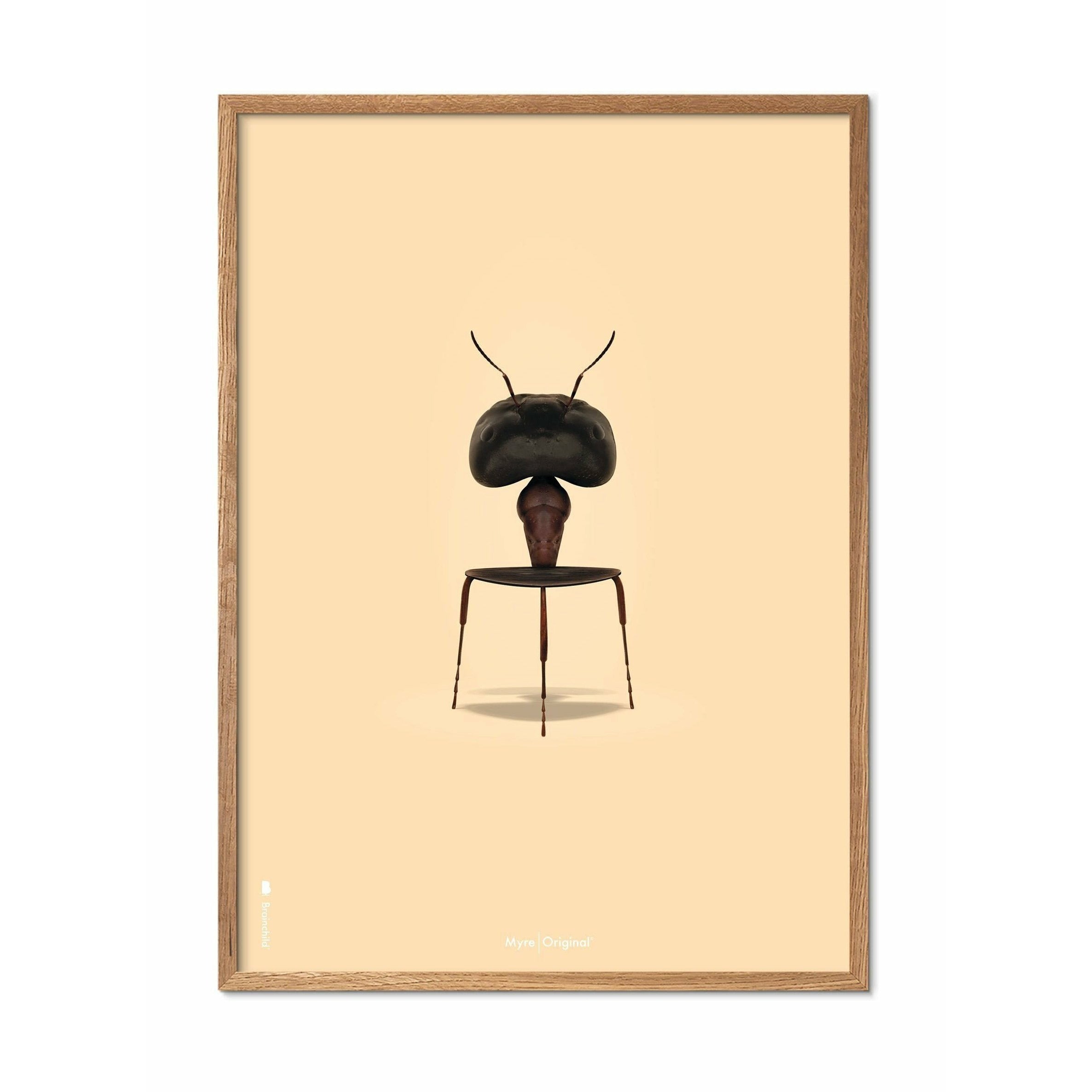Pomysłowy plakat mrówek, rama wykonana z jasnego drewna A5, tło w kolorze piasku