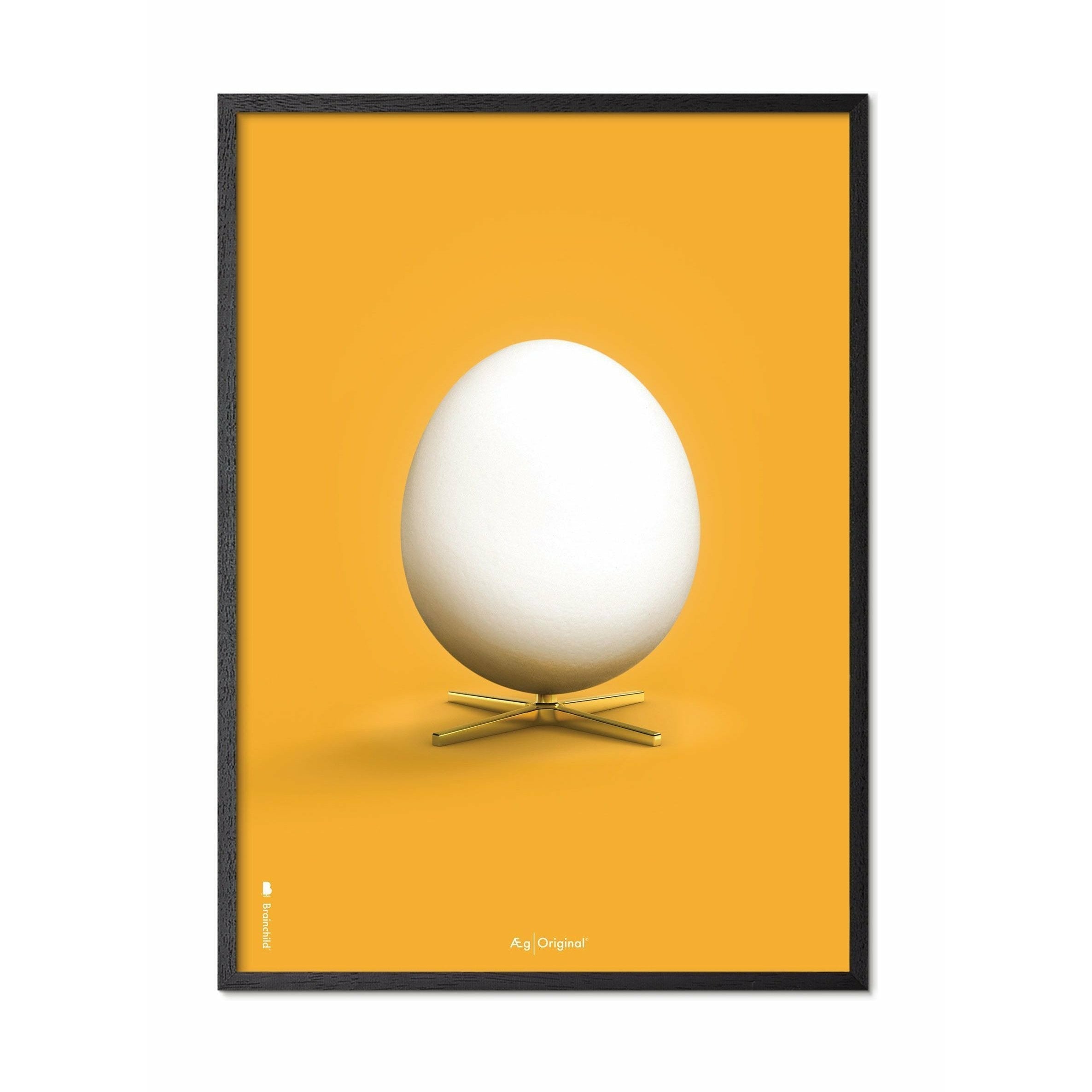 Klasyczny plakat z jajkiem pomysłu, rama w czarnym lakierowanym drewnie A5, żółte tło